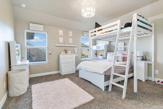 500 Pecan Farms, New Braunfels, TX 78130 - carpeted bedroom featuring baseboards and multiple windows