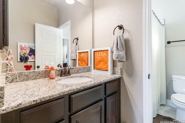 500 Pecan Farms, New Braunfels, TX 78130 - bathroom with tile patterned flooring, toilet, and vanity