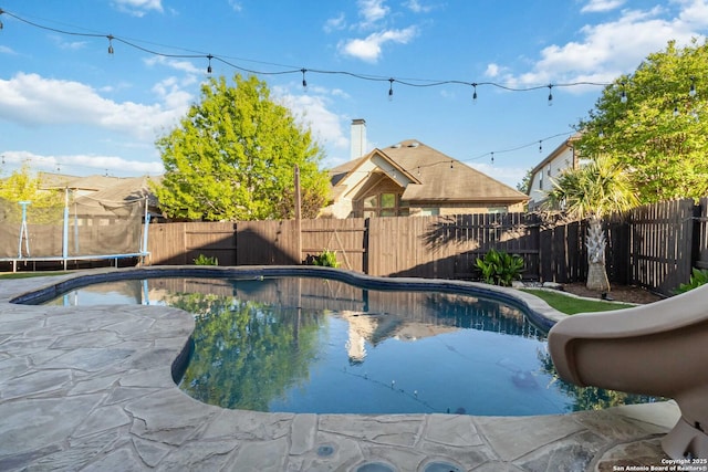 500 Pecan Farms, New Braunfels, TX 78130 - view of swimming pool featuring a trampoline, a fenced backyard, and a fenced in pool