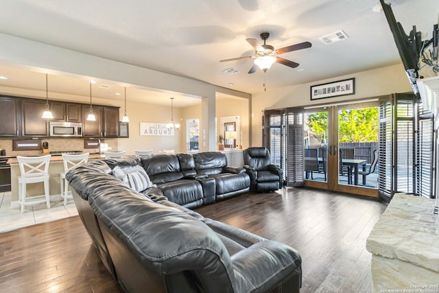 500 Pecan Farms, New Braunfels, TX 78130 - living room with french doors, wood-type flooring, ceiling fan, and visible vents