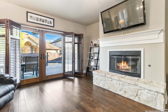 500 Pecan Farms, New Braunfels, TX 78130 - unfurnished living room with french doors, wood finished floors, and a glass covered fireplace