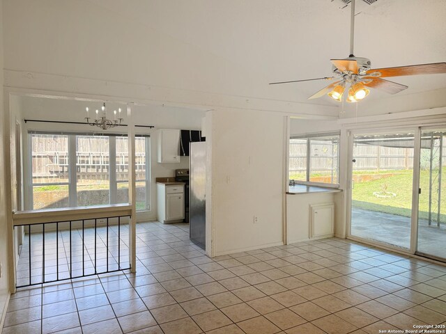 7401 Oak Marsh, Live Oak, TX 78233 - interior space with ceiling fan with notable chandelier and light tile patterned floors