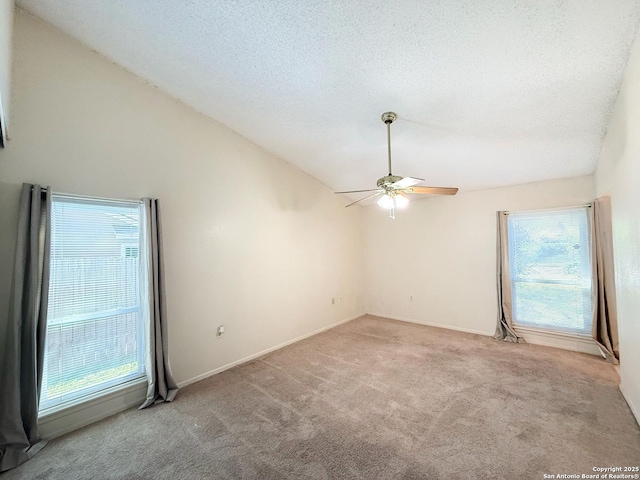 7401 Oak Marsh, Live Oak, TX 78233 - empty room featuring a wealth of natural light, ceiling fan, carpet, and lofted ceiling