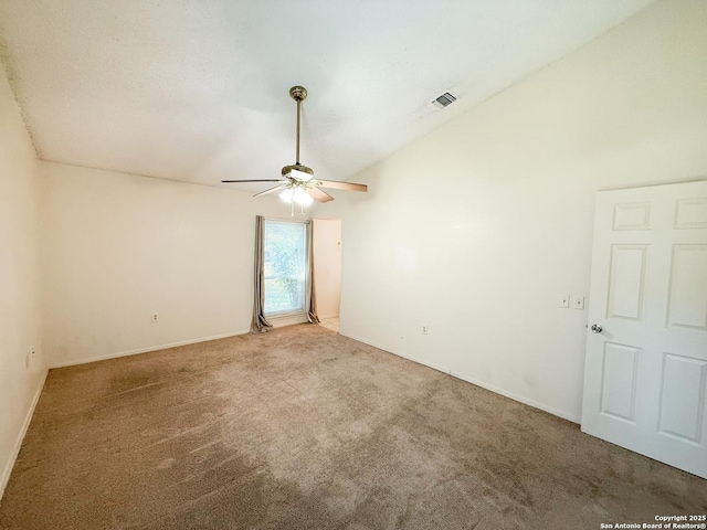 7401 Oak Marsh, Live Oak, TX 78233 - unfurnished room featuring visible vents, ceiling fan, carpet flooring, and lofted ceiling