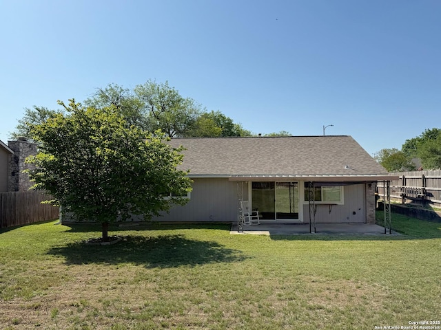 7401 Oak Marsh, Live Oak, TX 78233 - rear view of property featuring a patio, fence, and a lawn