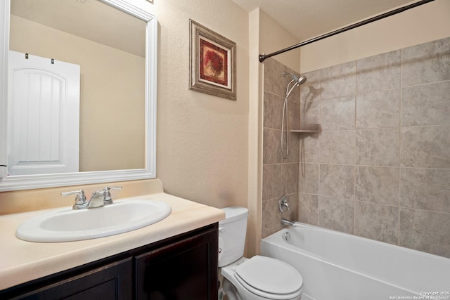258 Gemsbok Gate, San Antonio, TX 78253 - full bath featuring a textured wall, vanity, shower / bathing tub combination, and toilet