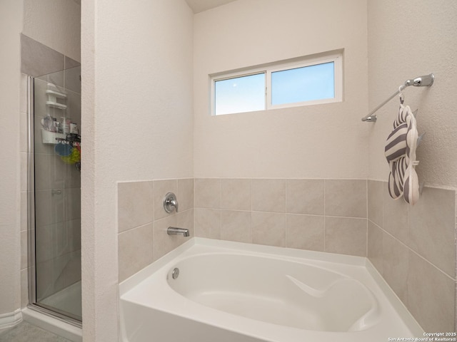 6810 Courante Waltz, San Antonio, TX 78252 - full bath featuring a bath and a stall shower