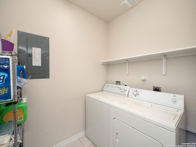 6810 Courante Waltz, San Antonio, TX 78252 - laundry room with laundry area, light tile patterned floors, visible vents, electric panel, and washing machine and clothes dryer