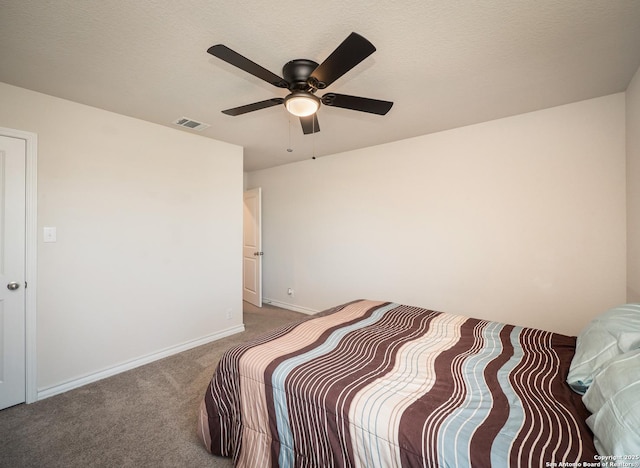 6810 Courante Waltz, San Antonio, TX 78252 - carpeted bedroom featuring visible vents, baseboards, a textured ceiling, and ceiling fan