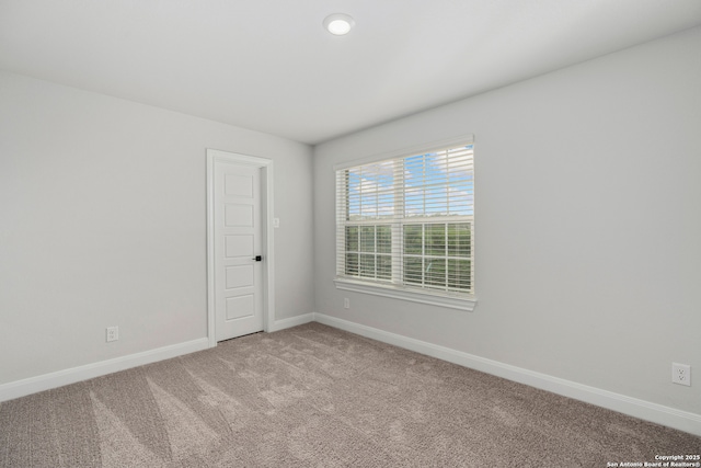 9622 Nubuck Br, Converse, TX 78109 - unfurnished room with light colored carpet and baseboards