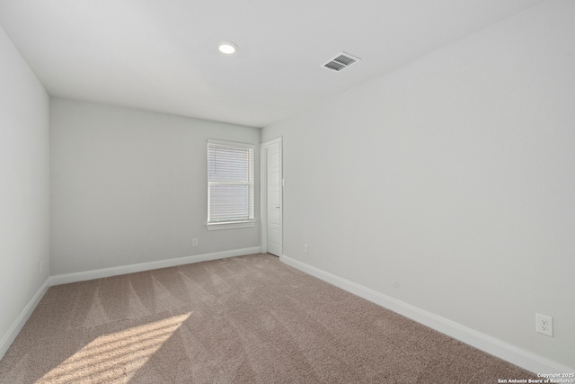 9622 Nubuck Br, Converse, TX 78109 - empty room featuring light colored carpet, baseboards, and visible vents