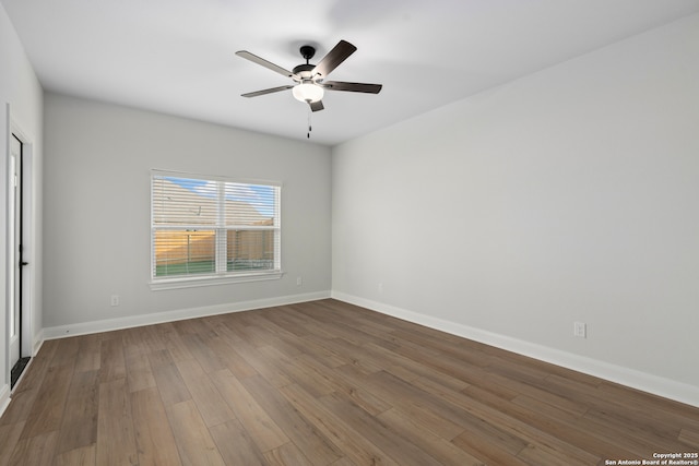9622 Nubuck Br, Converse, TX 78109 - empty room with baseboards, a ceiling fan, and wood finished floors