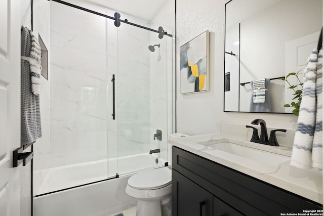 1019 S Hackberry, San Antonio, TX 78210 - full bathroom with toilet, vanity, a textured wall, and bath / shower combo with glass door