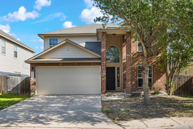 9311 Longmire, San Antonio, TX 78245 - traditional-style house featuring brick siding, a garage, driveway, and a shingled roof