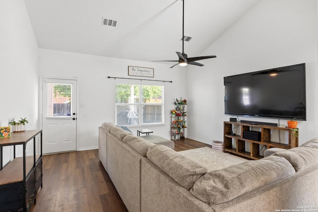 9311 Longmire, San Antonio, TX 78245 - living room featuring dark wood-style floors, a ceiling fan, high vaulted ceiling, and baseboards
