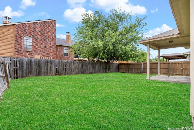 9311 Longmire, San Antonio, TX 78245 - view of yard featuring a patio