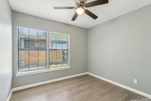 2415 Spicewood, San Antonio, TX 78213 - unfurnished room with wood finished floors, baseboards, and ceiling fan