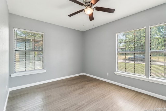 2415 Spicewood, San Antonio, TX 78213 - spare room with wood finished floors, baseboards, and ceiling fan