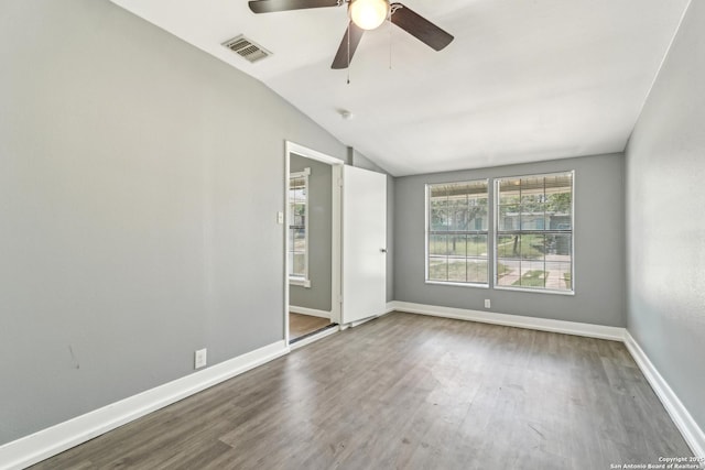 2415 Spicewood, San Antonio, TX 78213 - unfurnished room featuring vaulted ceiling, ceiling fan, wood finished floors, and baseboards