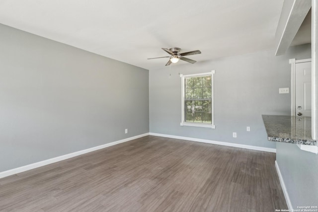2415 Spicewood, San Antonio, TX 78213 - empty room featuring a ceiling fan, baseboards, and dark wood finished floors