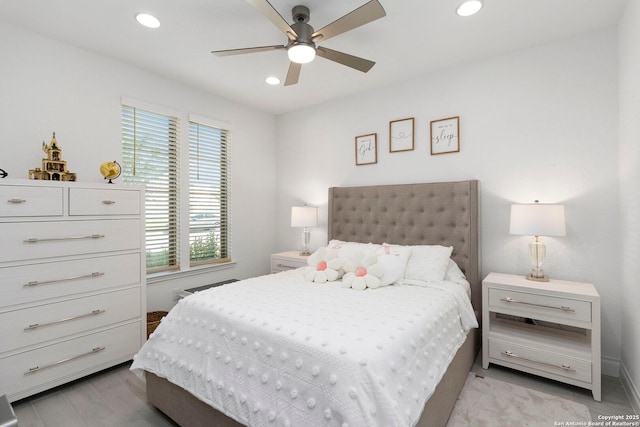 bedroom featuring light wood-type flooring, recessed lighting, and ceiling fan
