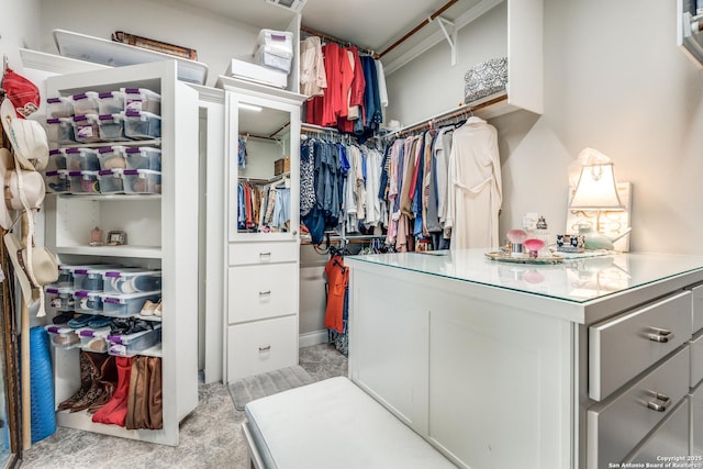 walk in closet with visible vents