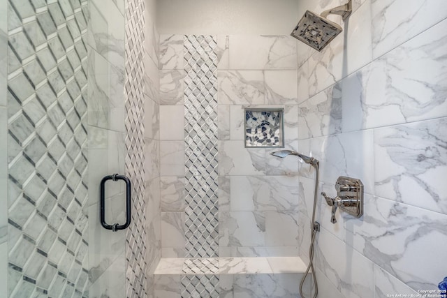 bathroom with a stall shower