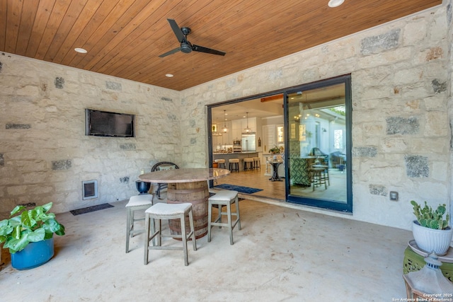 view of patio / terrace featuring outdoor dining area and a ceiling fan