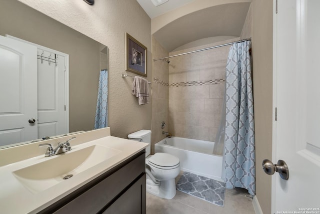11347 Phoebe Lace, San Antonio, TX 78253 - full bathroom with vanity, toilet, shower / tub combo with curtain, tile patterned floors, and a textured wall