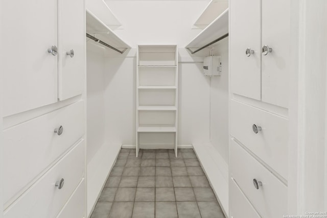 6826 Horwich, San Antonio, TX 78239 - walk in closet featuring light tile patterned flooring