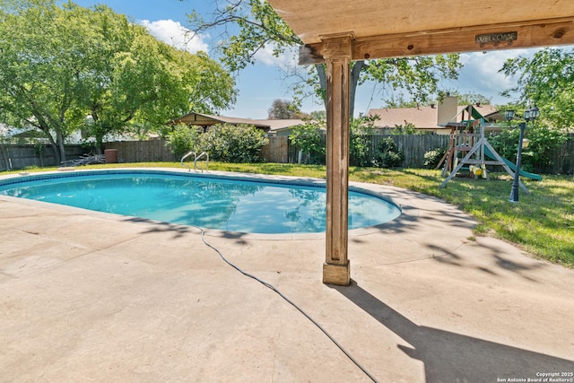 6826 Horwich, San Antonio, TX 78239 - view of pool with a fenced in pool, a patio area, a fenced backyard, and a playground