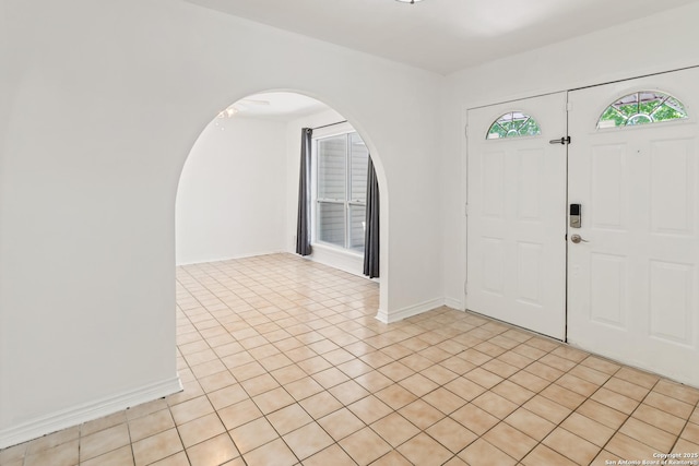 6826 Horwich, San Antonio, TX 78239 - entrance foyer with arched walkways, light tile patterned floors, and baseboards