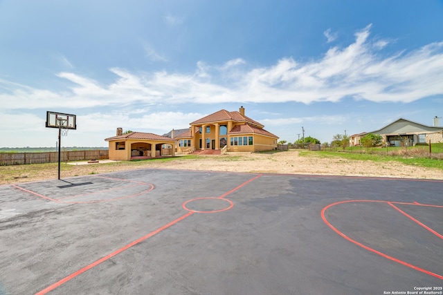 12022 Del Rio Run, San Antonio, TX 78245 - view of sport court featuring community basketball court, a gazebo, and fence
