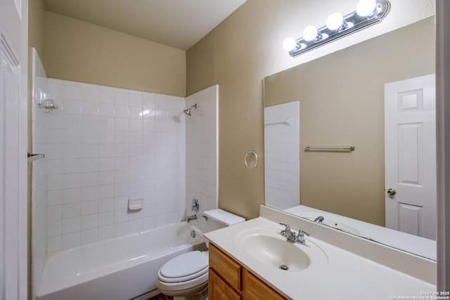 full bath with shower / bathtub combination, vanity, and toilet