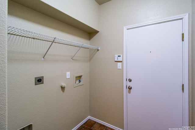 laundry area featuring baseboards, hookup for an electric dryer, laundry area, and washer hookup
