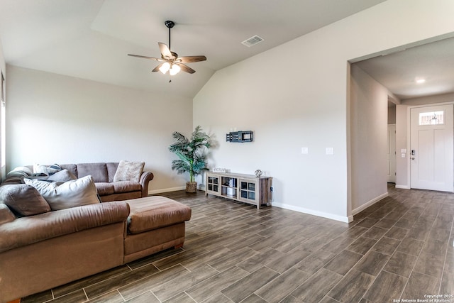 living room featuring ceiling fan, wood finish floors, vaulted ceiling, visible vents, and baseboards