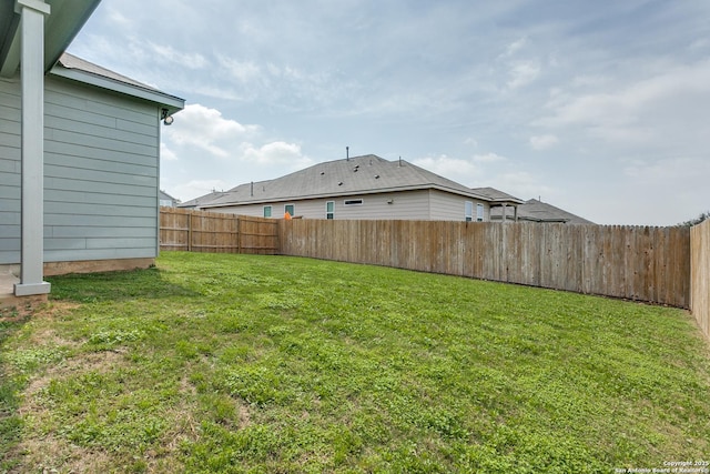 view of yard featuring a fenced backyard