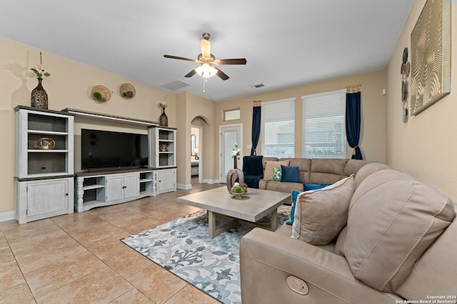 14047 Pikesdale, San Antonio, TX 78253 - living area featuring visible vents, ceiling fan, arched walkways, and light tile patterned floors