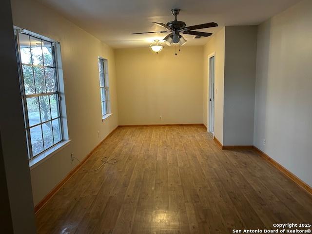 7834 Sun Frst, San Antonio, TX 78239 - spare room with hardwood / wood-style floors, ceiling fan, and baseboards