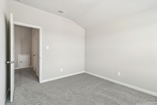 18107 Ansley, San Antonio, TX 78247 - carpeted spare room featuring visible vents, baseboards, and vaulted ceiling