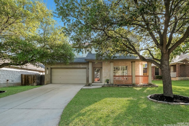 view of front of property with concrete driveway, roof with shingles, an attached garage, a front yard, and fence