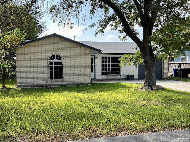 5874 Castle Hunt, San Antonio, TX 78218 - single story home with concrete driveway, a front yard, brick siding, and an attached garage