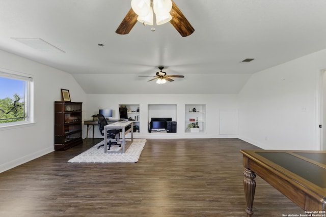 home office with visible vents, baseboards, built in features, ceiling fan, and vaulted ceiling
