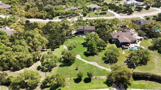 birds eye view of property with a residential view