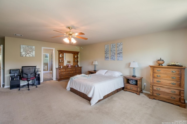 bedroom featuring light colored carpet, baseboards, a ceiling fan, and visible vents
