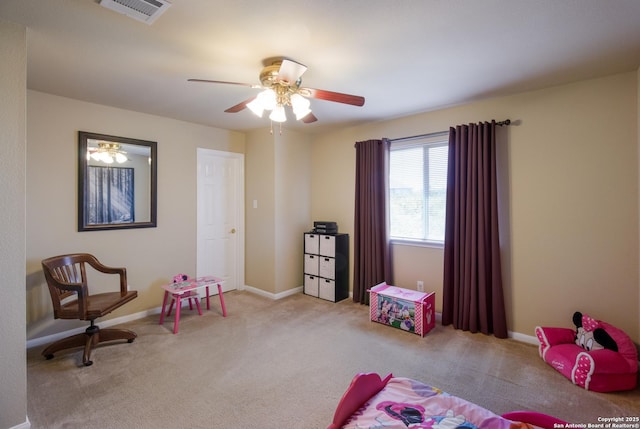 interior space featuring visible vents, ceiling fan, carpet flooring, and baseboards