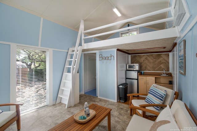 living room featuring vaulted ceiling