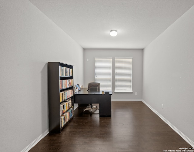 7635 Mission Smt, Boerne, TX 78015 - office space featuring dark wood-style flooring and baseboards