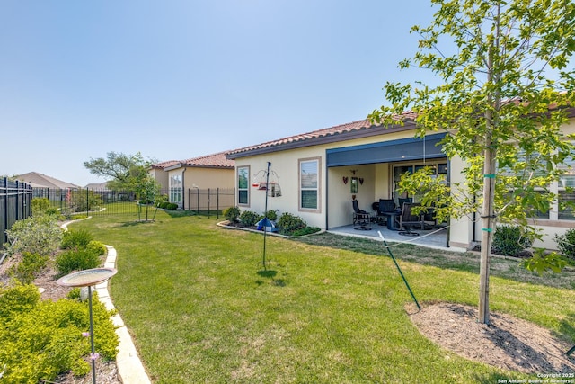 22522 Estacado, San Antonio, TX 78261 - back of property with fence, a patio, a lawn, and stucco siding