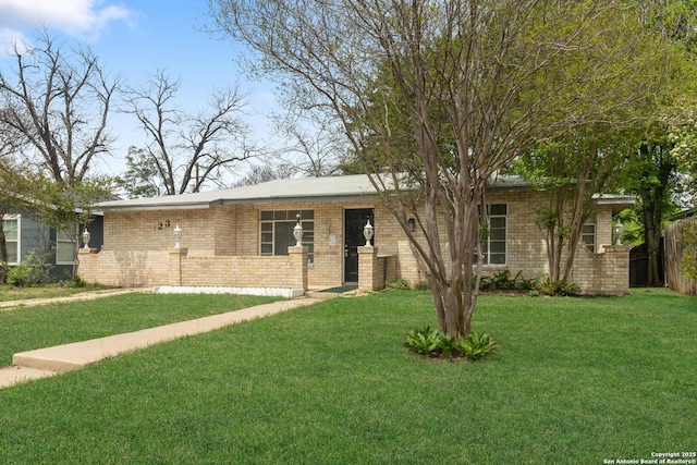 123 Haby Dr, San Antonio, TX 78212 - ranch-style house featuring a front yard, brick siding, and fence